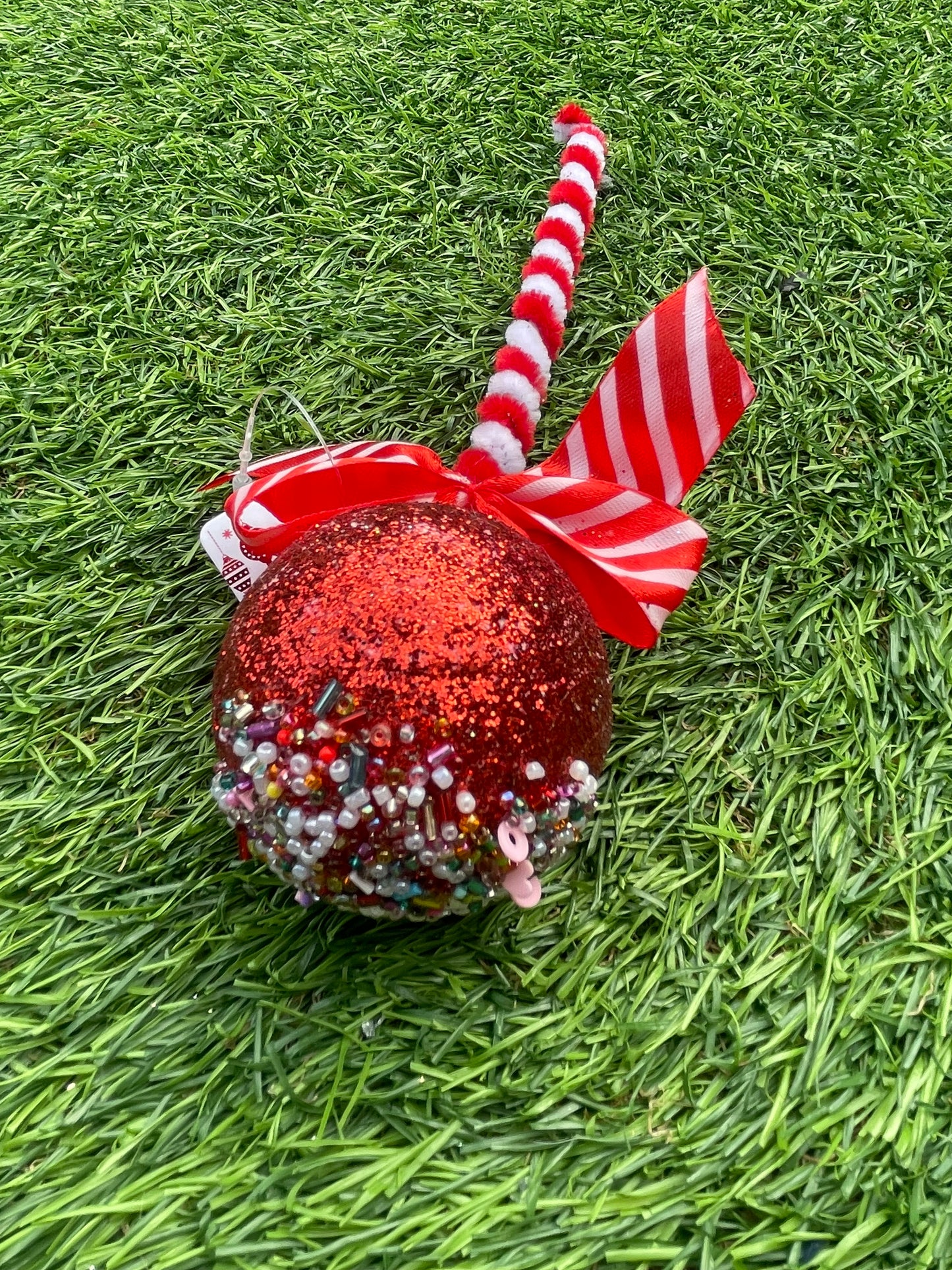 RED GLITTER TOP BOW LOLLIPOP