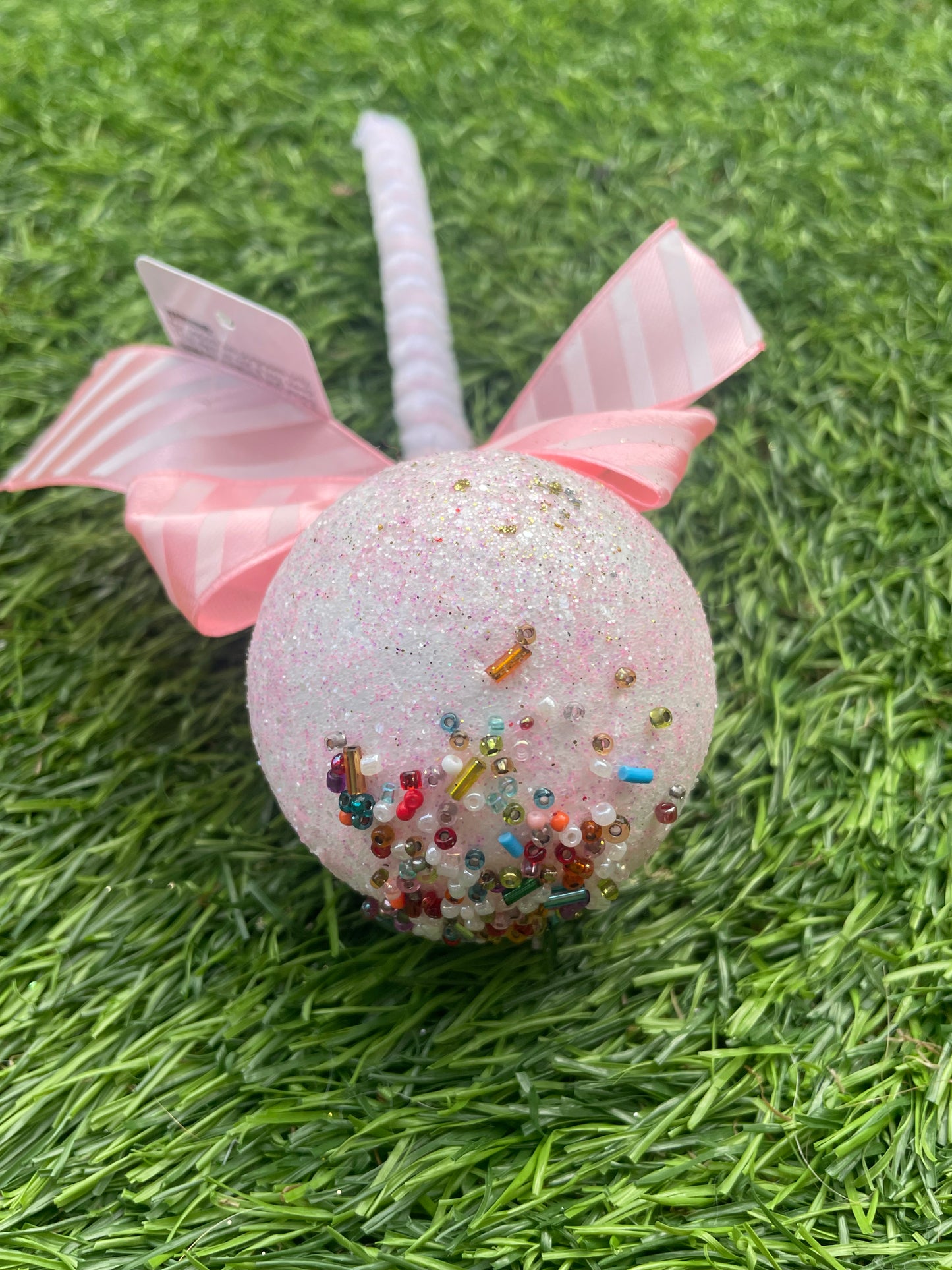 PINK GLITTER TOP BOW LOLLIPOP